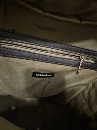 Mochila verde acolchada
