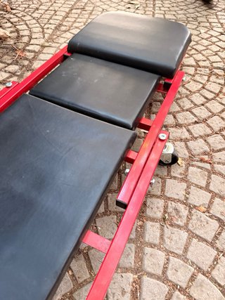 Camilla convertible a taburete con ruedas
