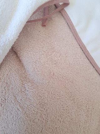 Capa de baño y babero para bebé
