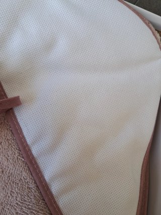 Capa de baño y babero para bebé