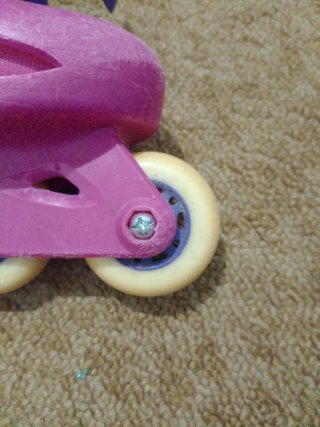 Patines en línea rosas y morados para niños