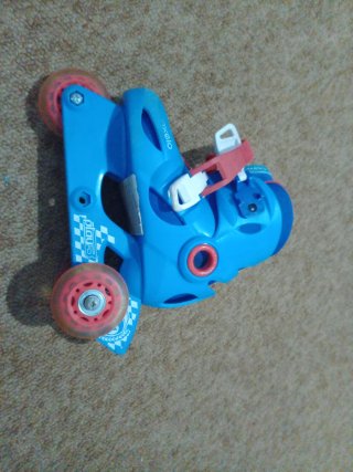 Patines en línea rosas y morados para niños