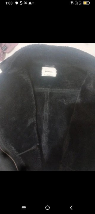 Abrigo negro de pelo auténtico