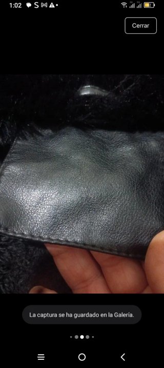 Abrigo negro con detalles de pelo