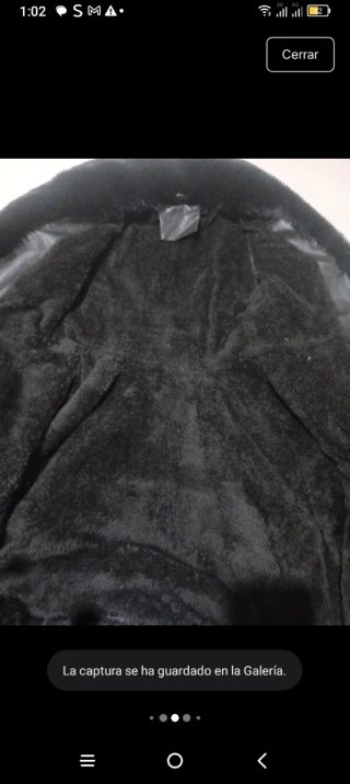 Abrigo negro con detalles de pelo