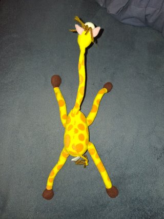Jirafa de peluche flexible