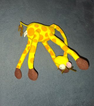 Jirafa de peluche flexible