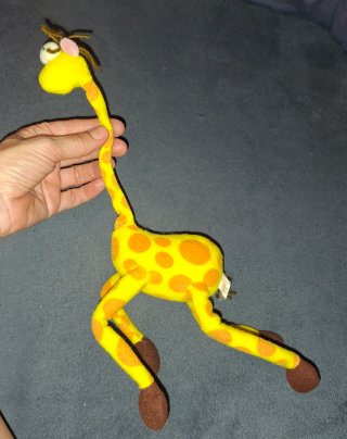Jirafa de peluche flexible