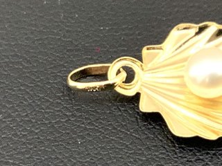 colgante oro 18k con piedra con perla