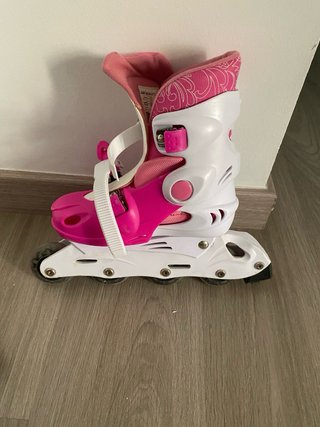 Patines en línea rosas y blancos