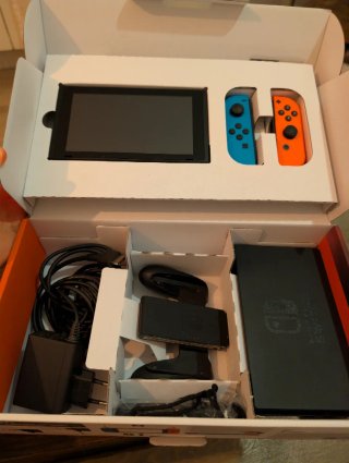 Nintendo Switch + Ring Fit Adventure y juegos