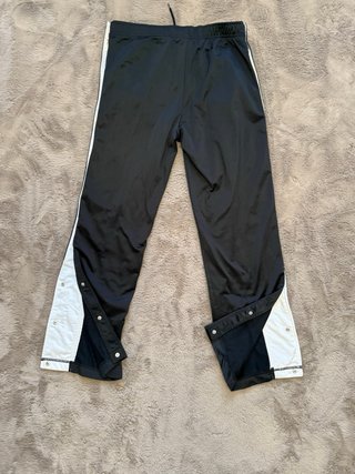 Pantalones Nike con botones laterales