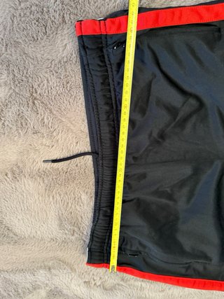Pantalones Nike con botones laterales