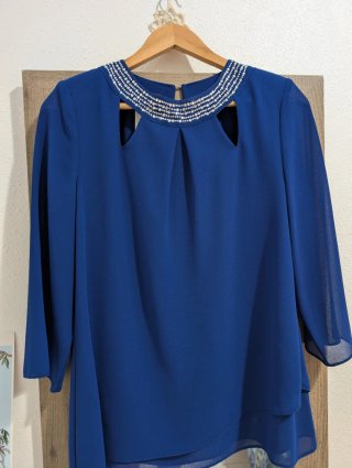 Conjunto de blusa y pantalón azul