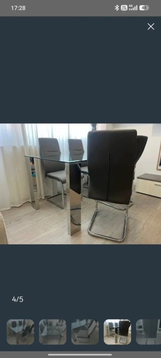 Mesa de cristal y 4 sillas