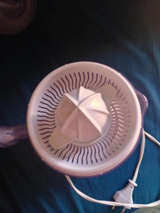 Exprimidor de naranjas eléctrico