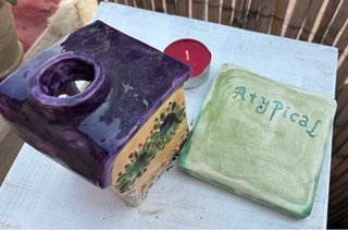 Casita de cerámica para velas