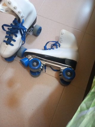 Patines de 4 ruedas blancos y azules # 38