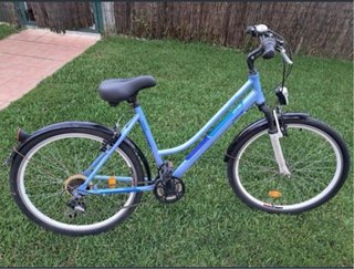 Bicicleta azul como nueva dhs travel