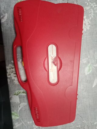 Xilófono infantil con baquetas.