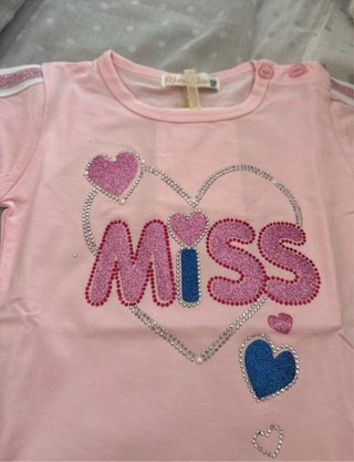 Conjunto niña camiseta rosa y shorts vaqueros