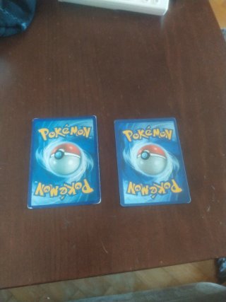 Cartas Pokémon Pheromosa GX y Kartana GX