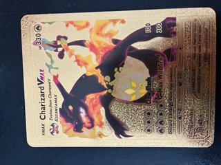 Charizard VMAX Carta Pokémon Dorada