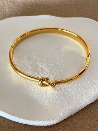 Pulsera nudo dorado en acero inoxidable