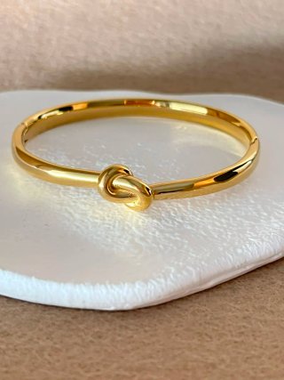 Pulsera nudo dorado en acero inoxidable
