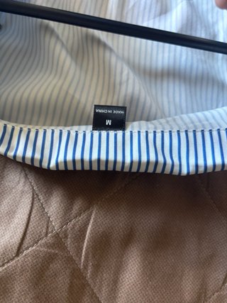 Camicia a righe blu e bianche