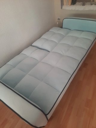Sofá cama azul celeste
