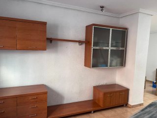 Mueble de comedor madera y cristal