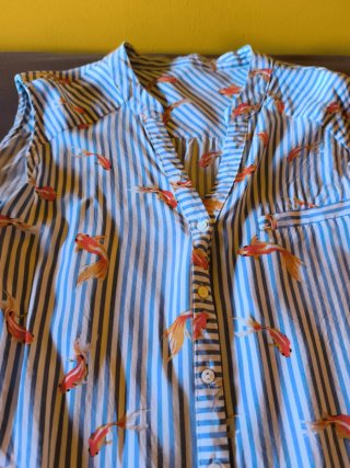 Conjunto short y camisa estampado peces