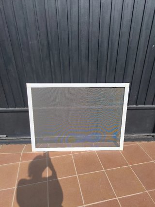 Mosquitera blanca para ventana