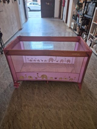 Cuna de viaje rosa