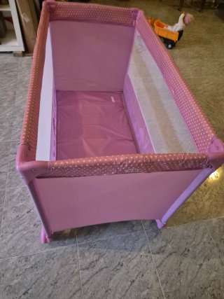 Cuna de viaje rosa