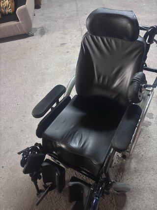 silla de ruedas basculante y posicionadora