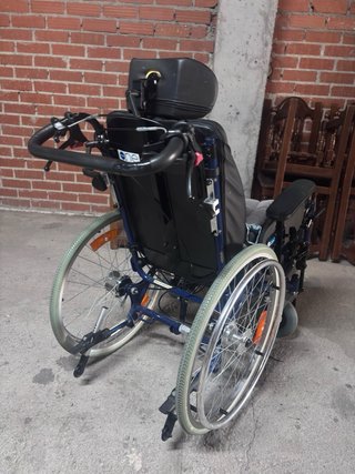 silla de ruedas basculante y posicionadora