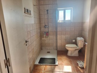 Terreno con casa