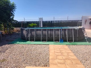 Terreno con casa