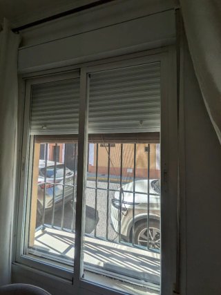 Ventana corredera con persiana