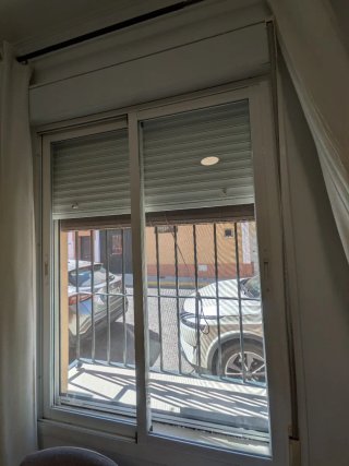 Ventana corredera con persiana