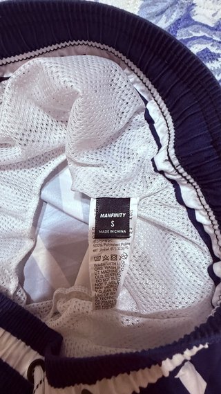 Costume a righe blu e bianche