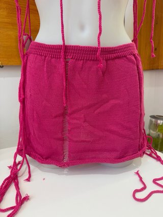 Conjunto tejido fucsia crop top y falda