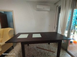 Mesa de salón madera y cristal