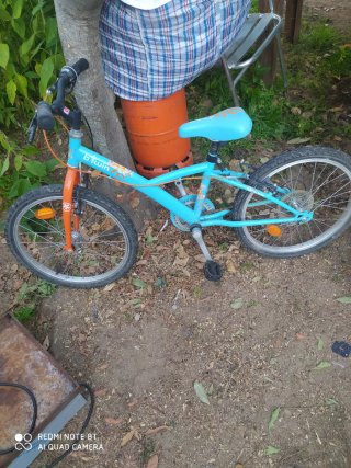 Bicicleta infantil Btwin azul y naranja