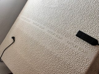Cama articulada 105cm junto a colchón.