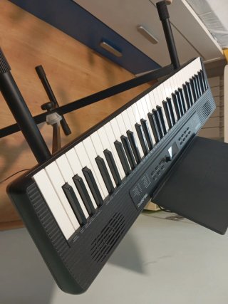 Teclado Alesis Melody 61+ soporte