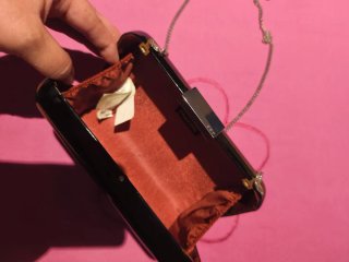 Bolso de mano rígido negro