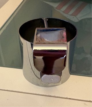 Sujeta planchas pelo plateado